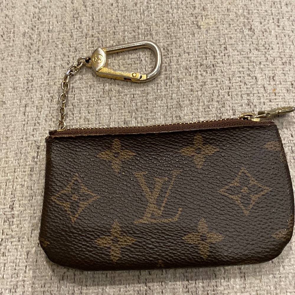 Louis Vuitton card holder keychain.